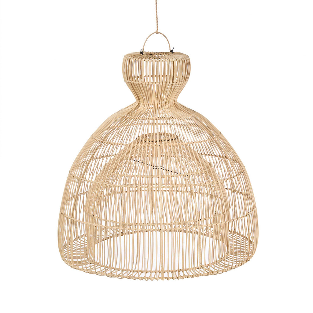 A large woven rattan pendant light hangs over a rustic outdoor kitchen island with three wooden bar stools, set under a covered patio with olive trees in the background.