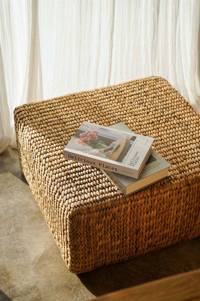 Woven pouffe on a white background