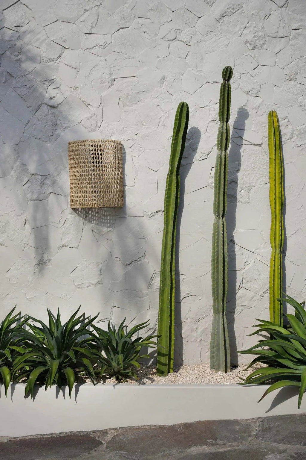 Woven wall applique with a textured pattern on a white background